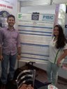 Docente em apresentação do Pibic sobre docência conjunta como estratégia ativa no ensino de física.jpg