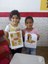 Crianças exibem desenhos confeccionados nas oficinas